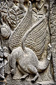 Prambanan - Ramayana reliefs of Shiva Temple. Detail of panel of Rama threatens a bird who stole offerings. 